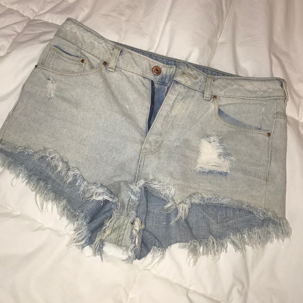 distressed light denim shorts